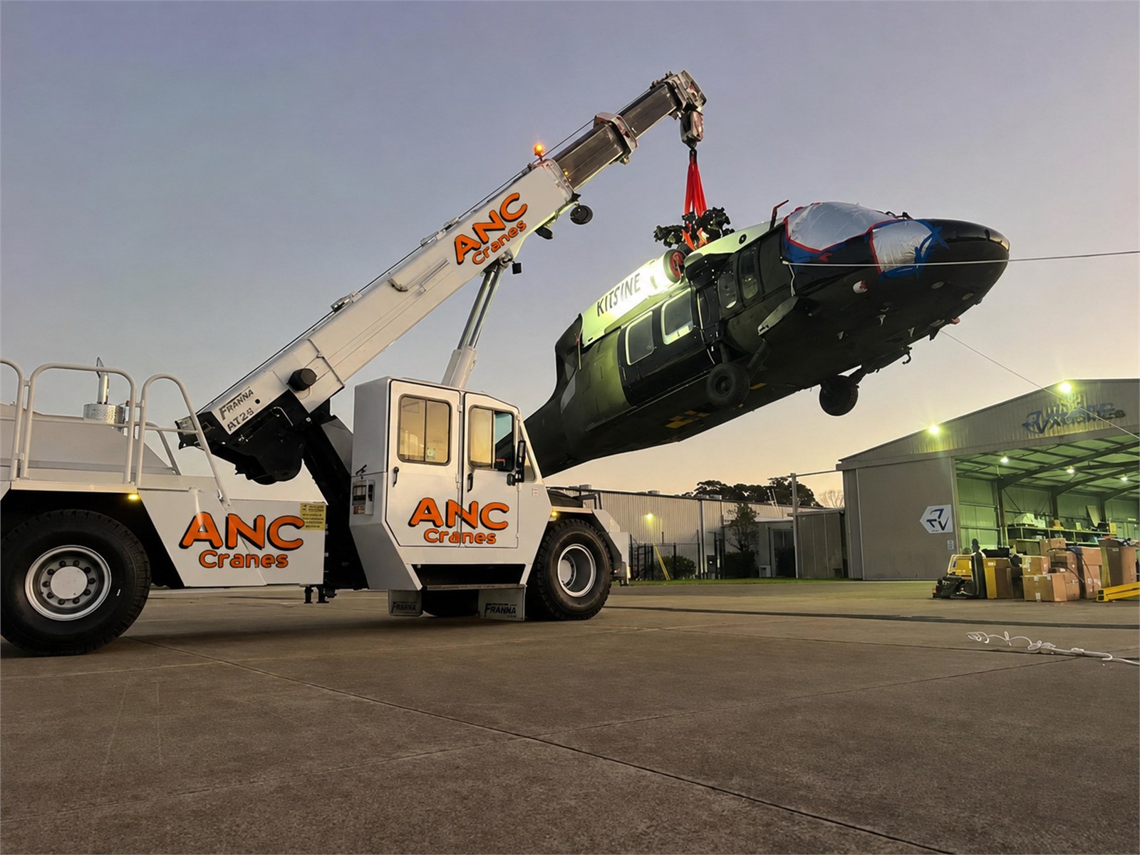 ANC Franna crane lifting a helicopter